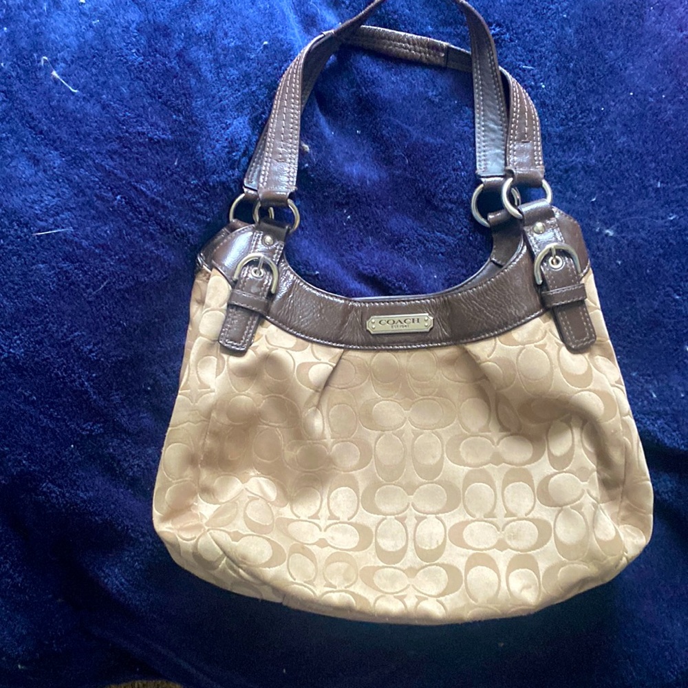 Use coach bag with three compartments